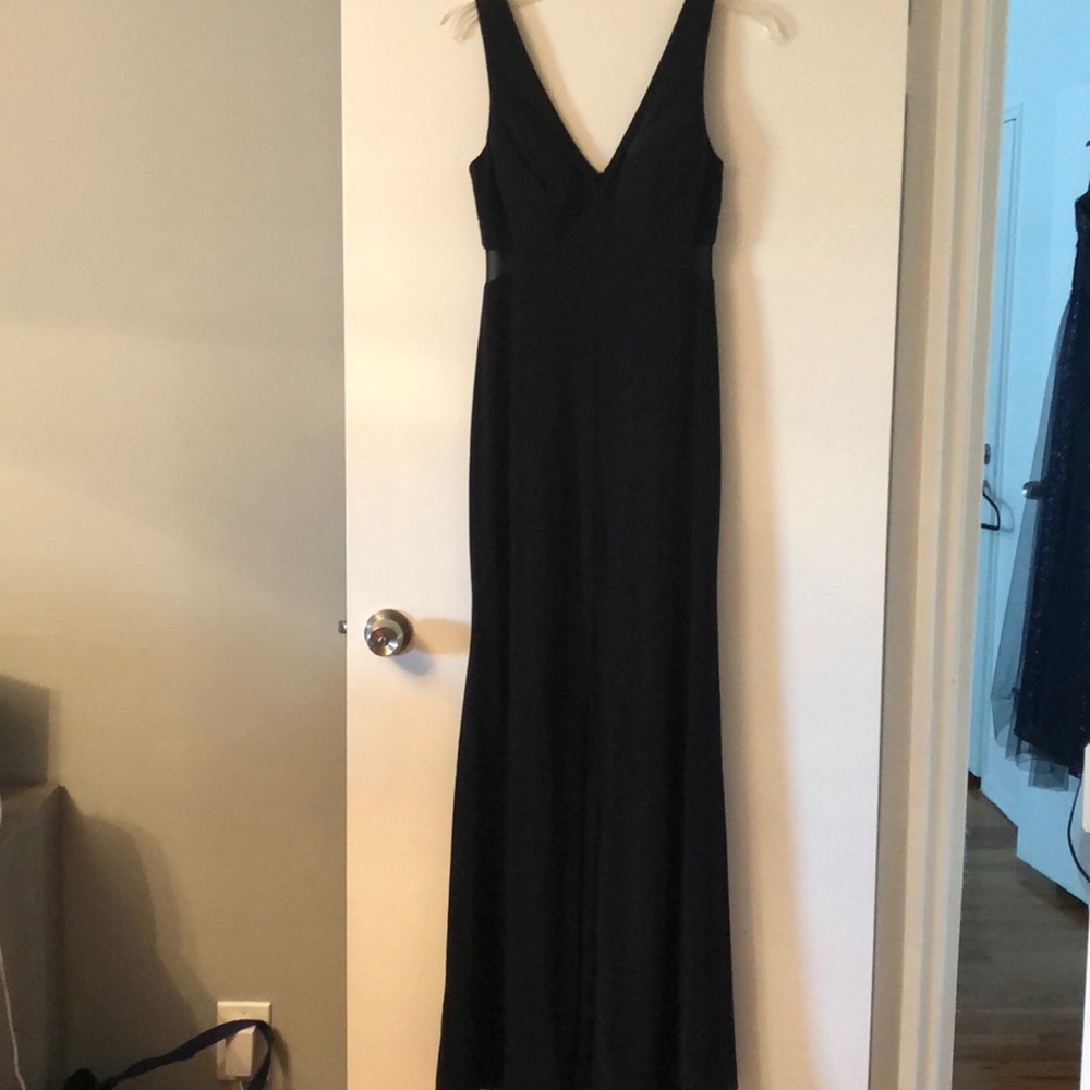 NWOT black sleek gown with mesh side inserts